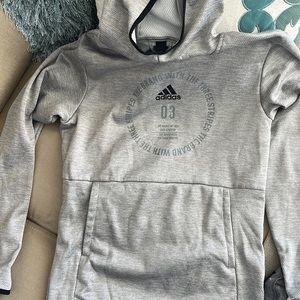 Grey Adidas light pullover hoodie.